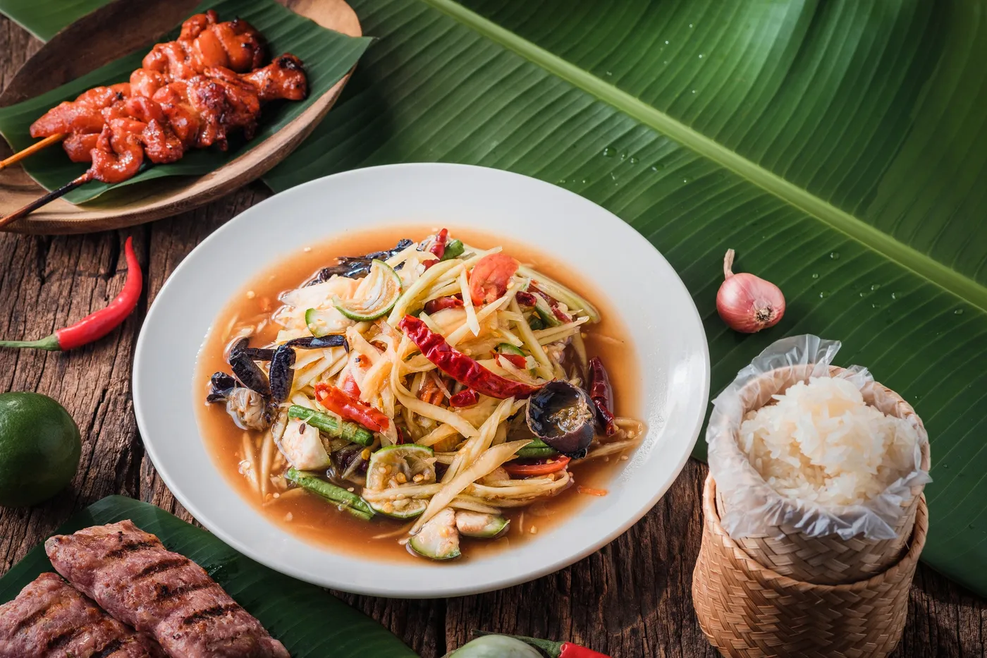 Lao and Thai street food plated at Kin Dee Street Kitchen in Calgary, Alberta
